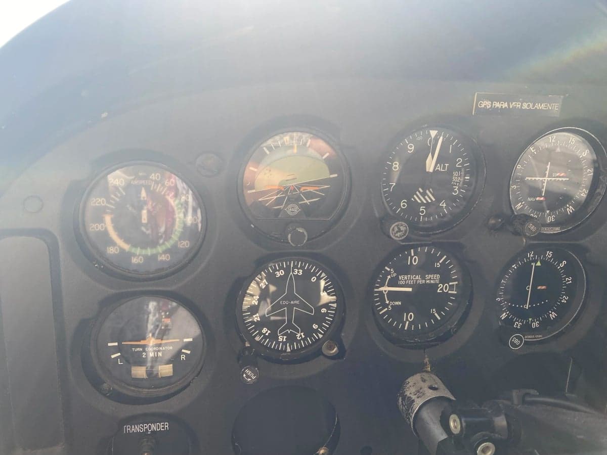 Close-up of the aircraft's instrument panel and gauges.