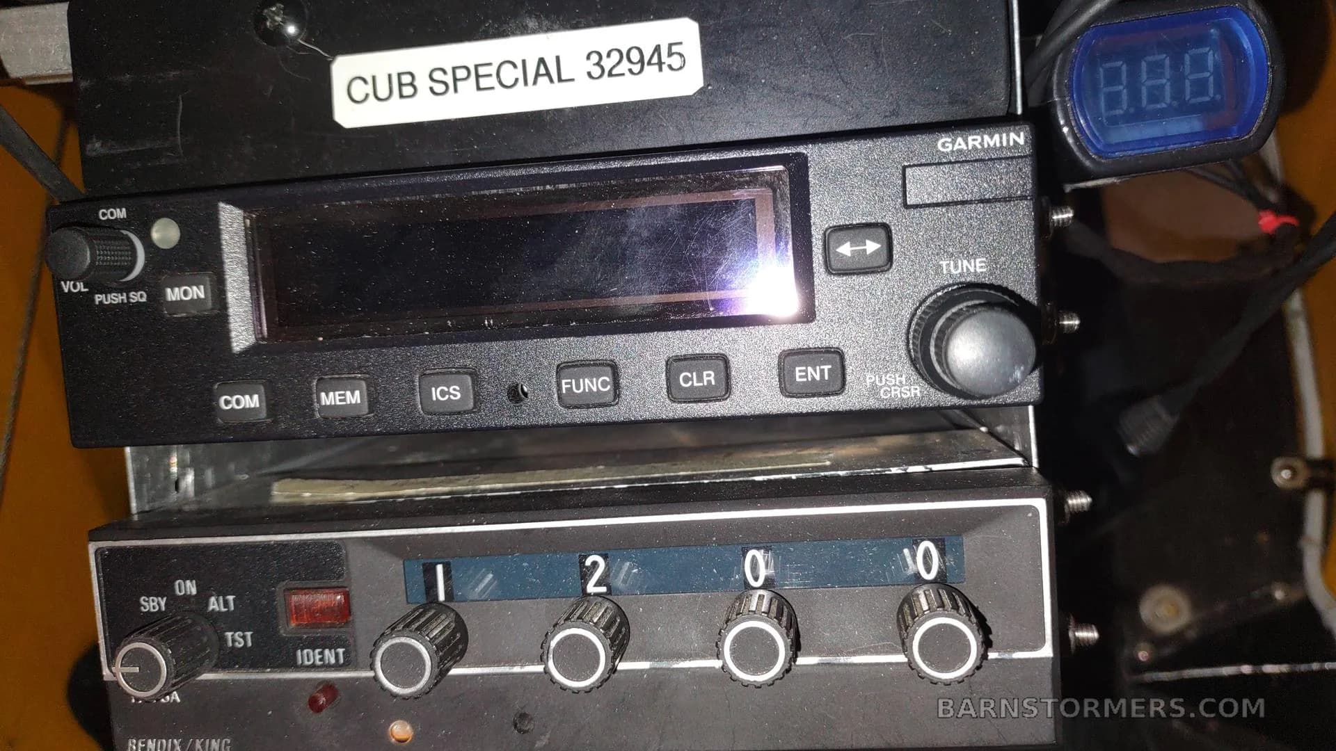 A close-up of the aircraft's avionics stack, including a Garmin radio and Bendix/King transponder.
