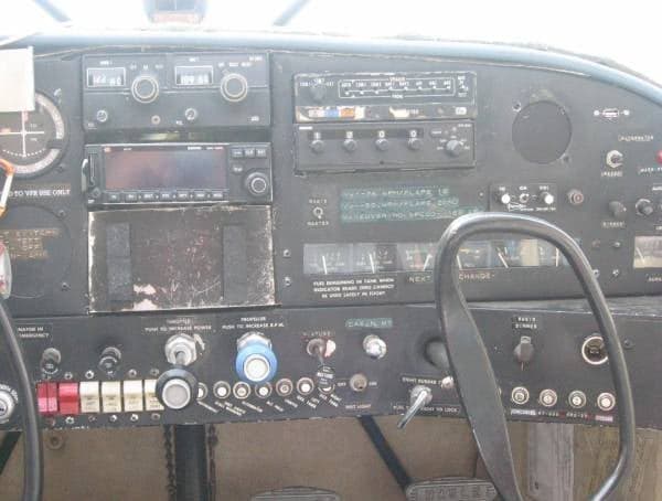 Close-up of the aircraft's instrument panel, showing various gauges and controls.