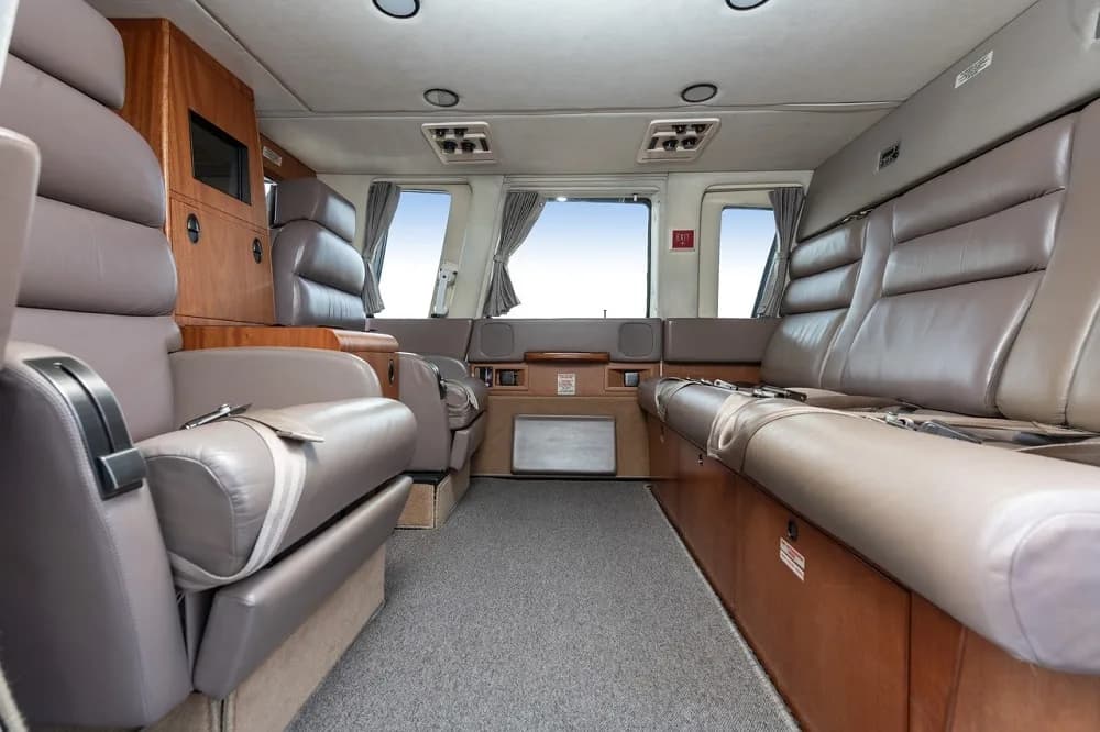 View of the helicopter's cabin seats and interior features.