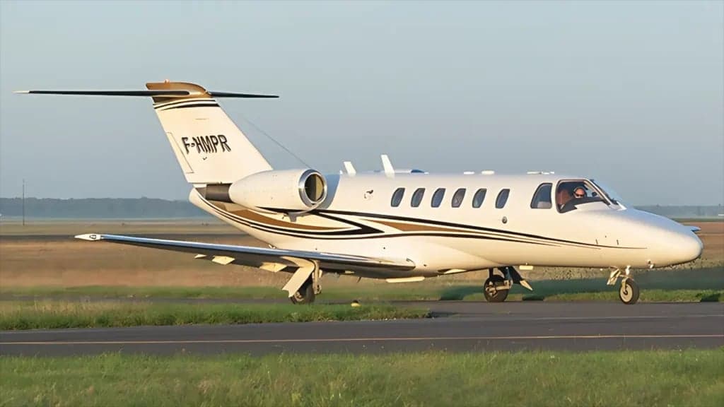 A Cessna Citation CJ2 aircraft with registration F-HMPR on the ground.
