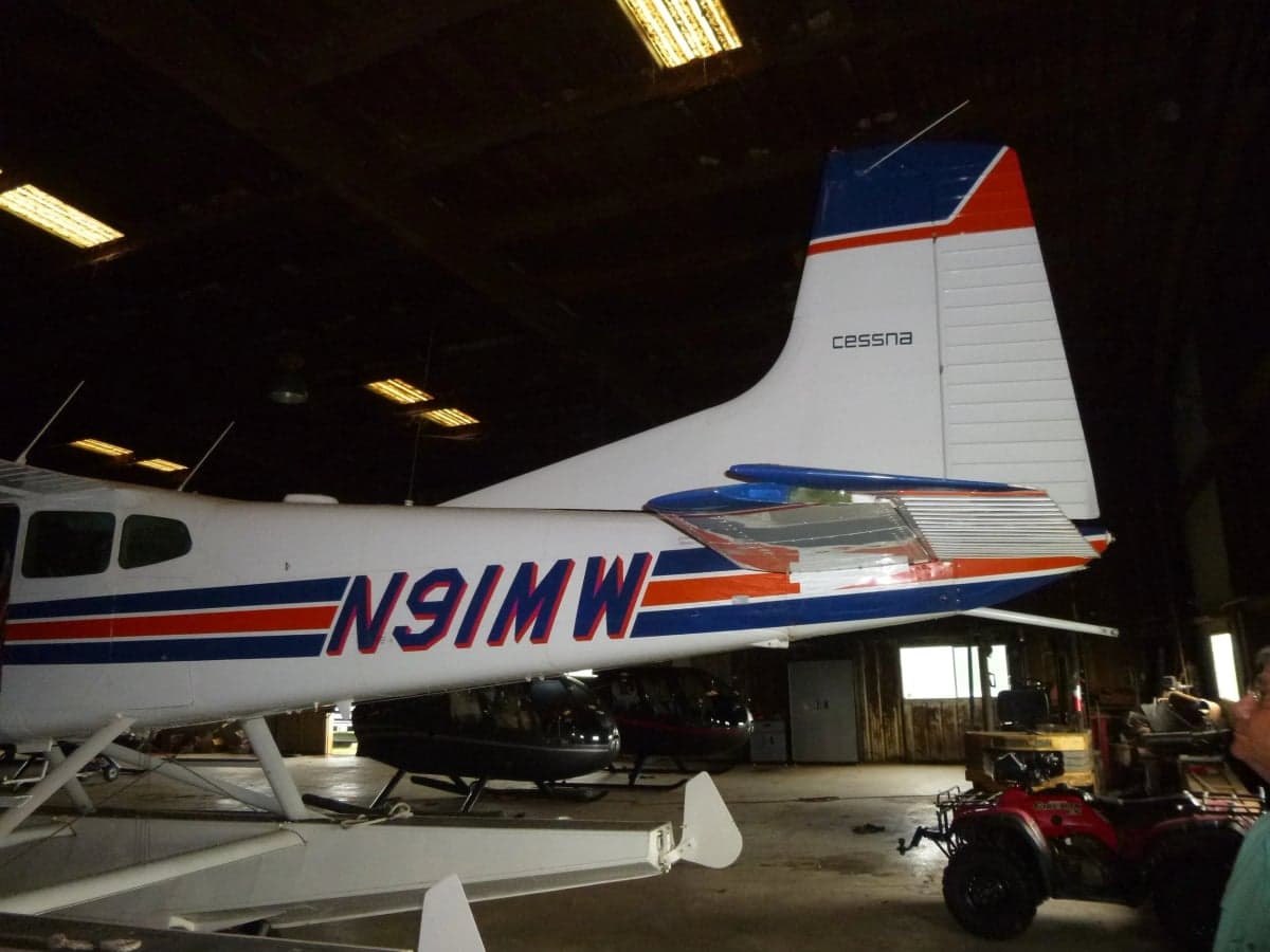 Tail section of a Cessna Skywagon 185 floatplane with registration N91MW.