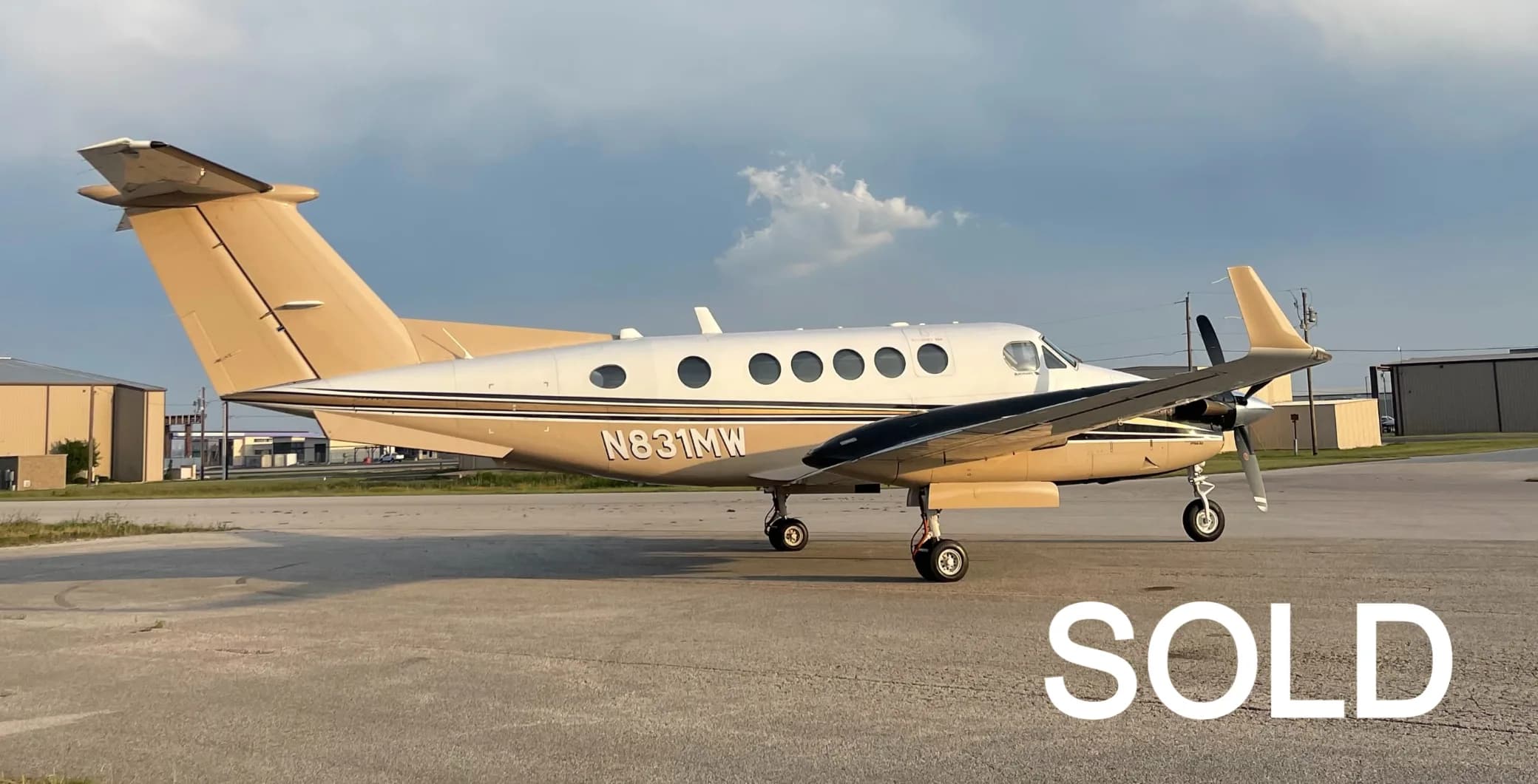 A Beechcraft King Air 360 on the tarmac with a SOLD overlay.