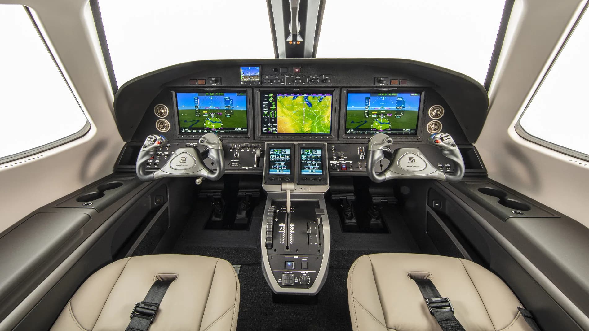 View of the cockpit instrument panel and seats.