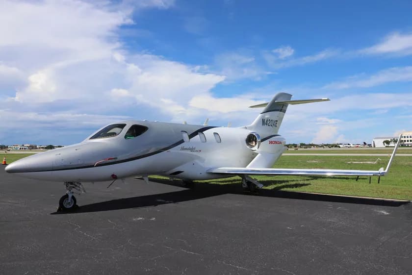 HondaJet Elite S with a silver and white paint scheme on the tarmac.
