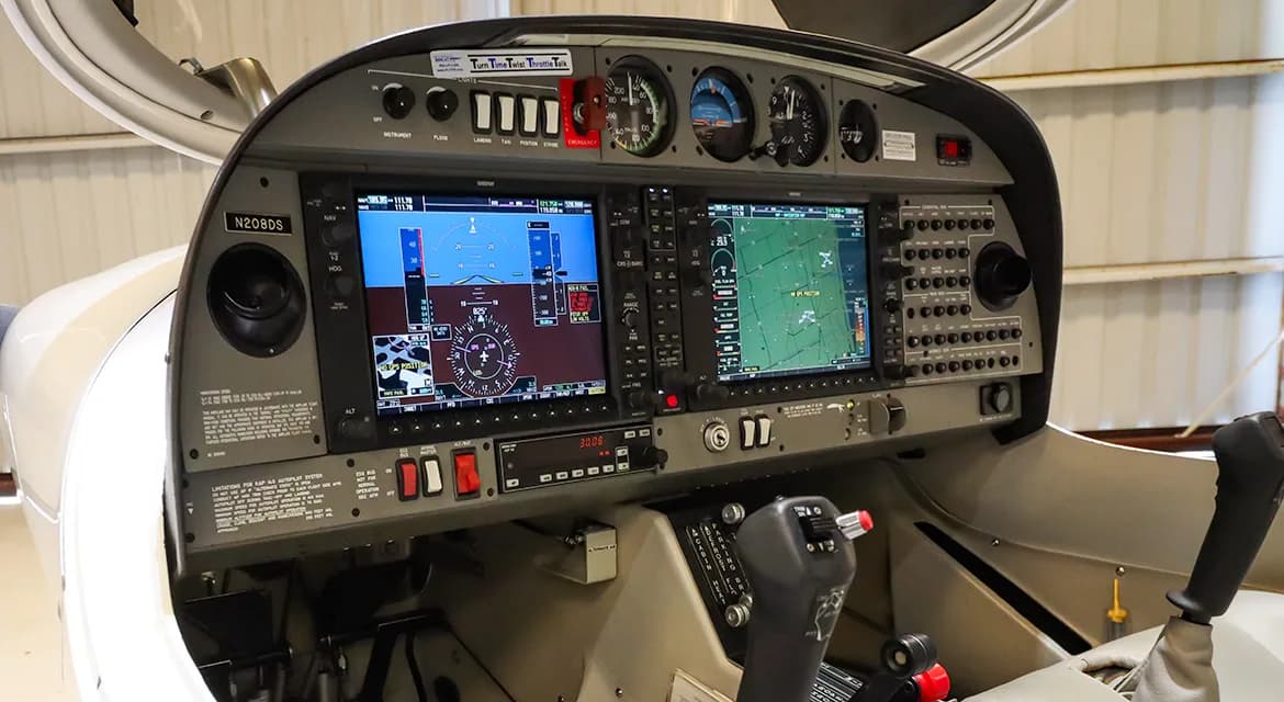 An angled view of the Diamond DA40 Star cockpit, featuring the Garmin G1000 avionics suite.