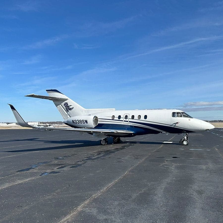 N338SW jet aircraft on the tarmac, side view.