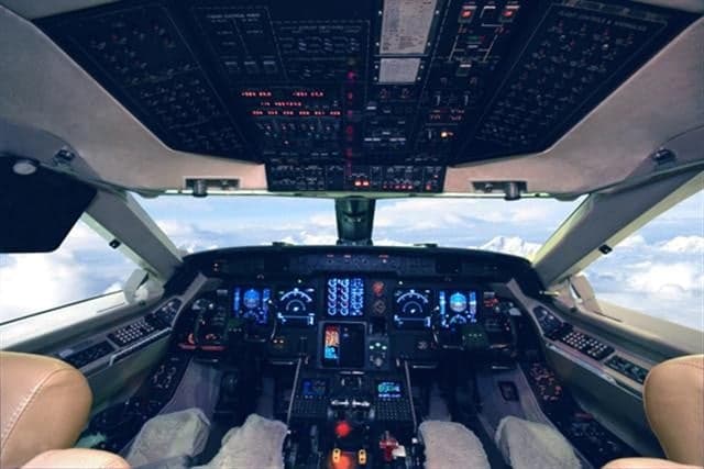 View of the Gulfstream cockpit with instrument panel and controls.