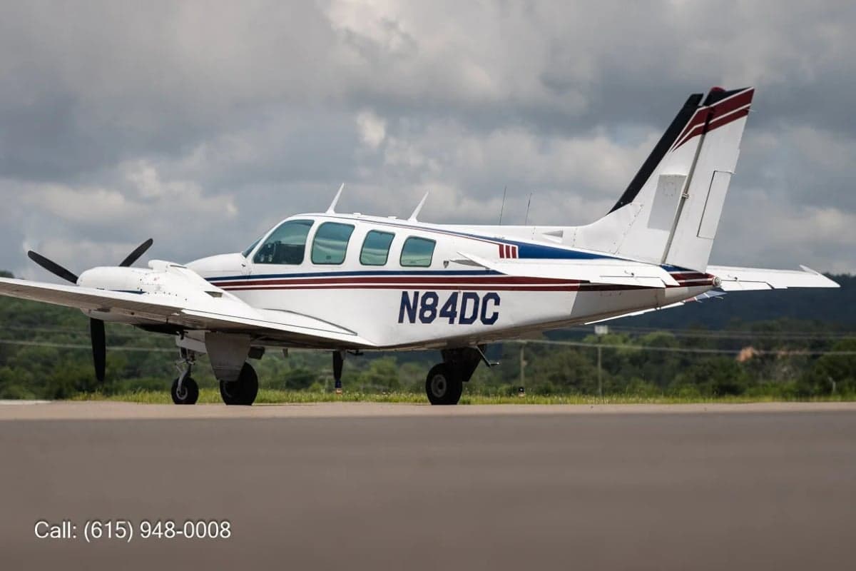 Side view of a Beechcraft Baron on the ramp.