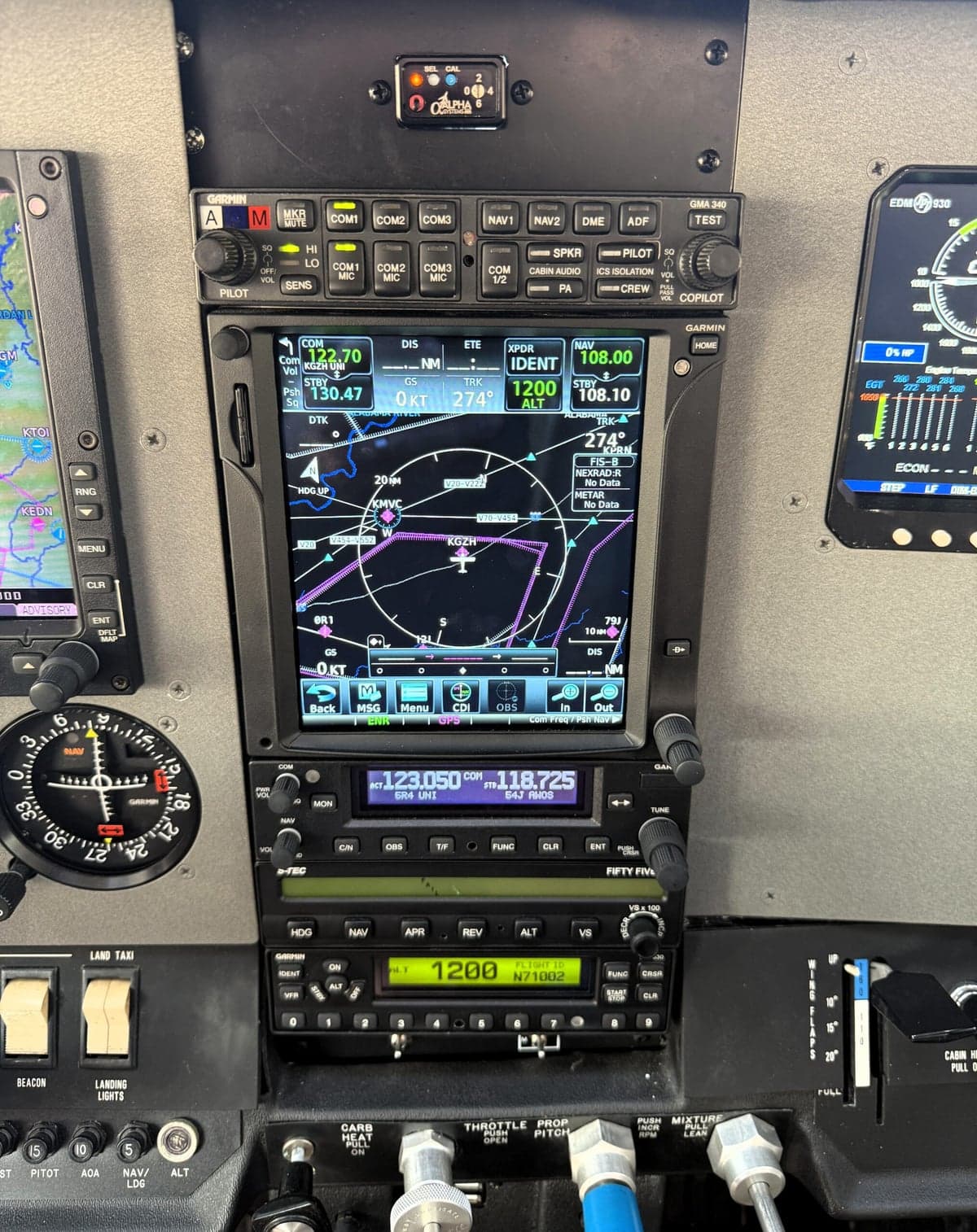 Close-up of the aircraft's avionics stack, including GPS and communication systems.