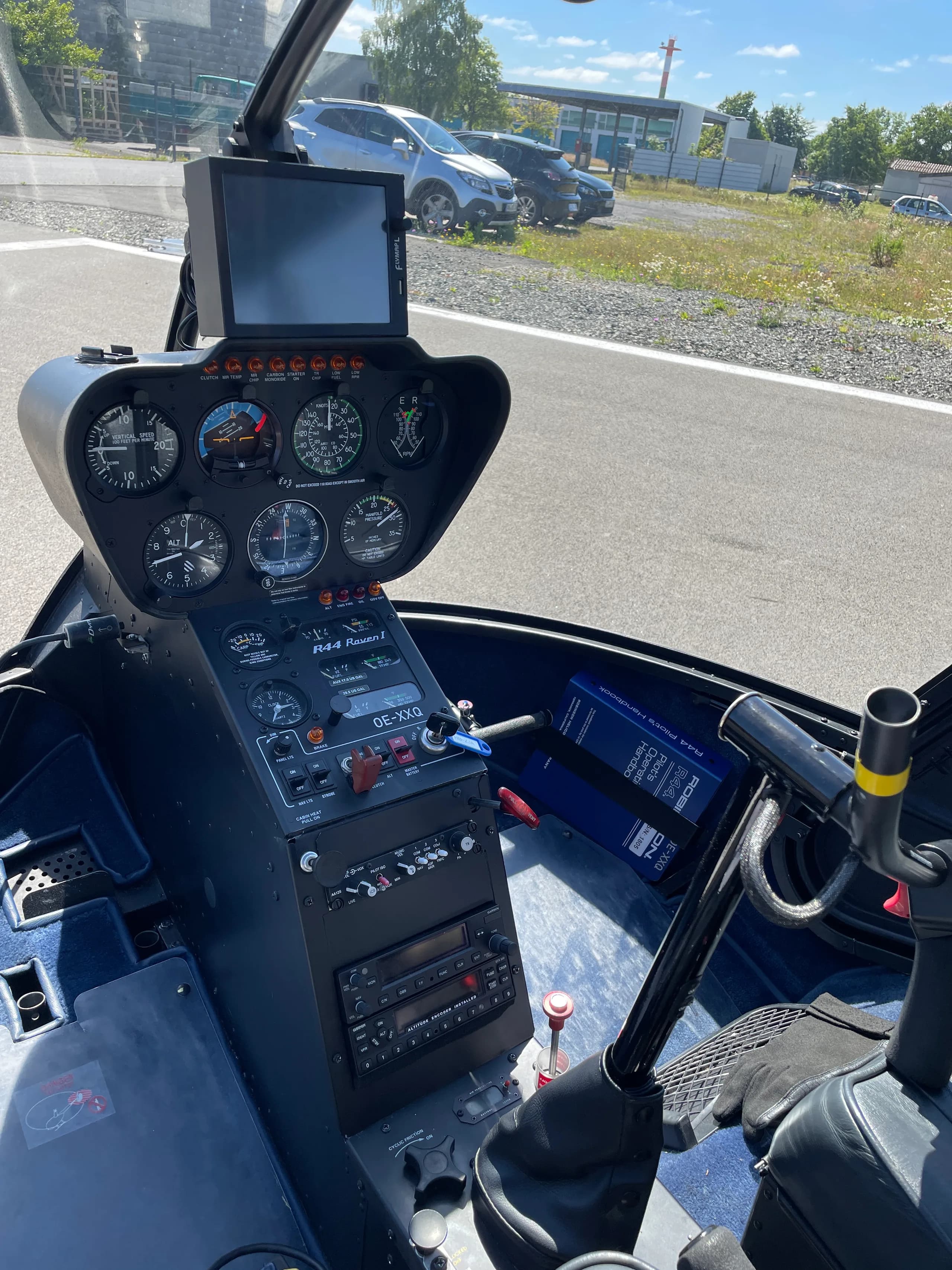 Cockpit view of the Robinson R44 Raven I OE-XXQ helicopter.