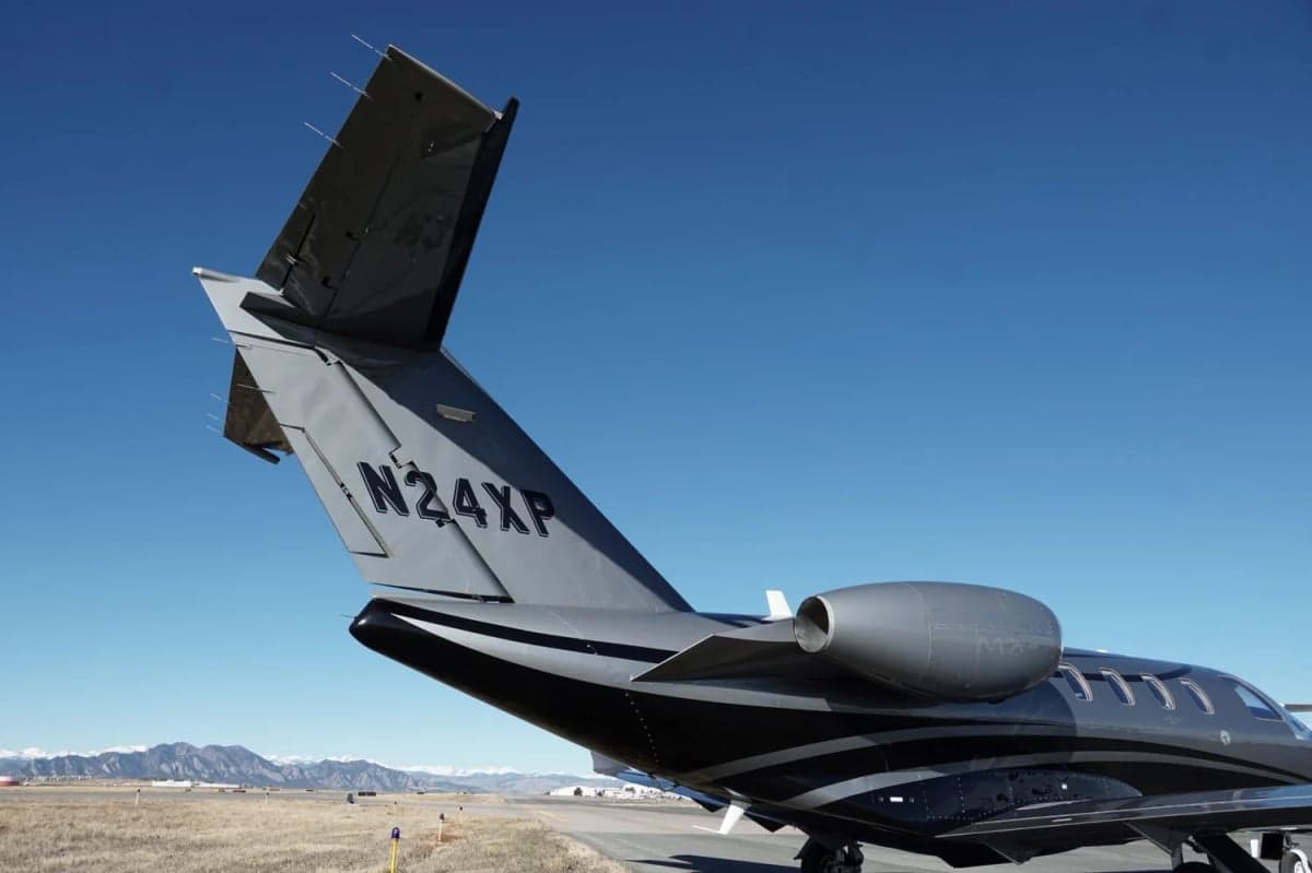 Tail section of a Citation M2 jet with registration N24XP.