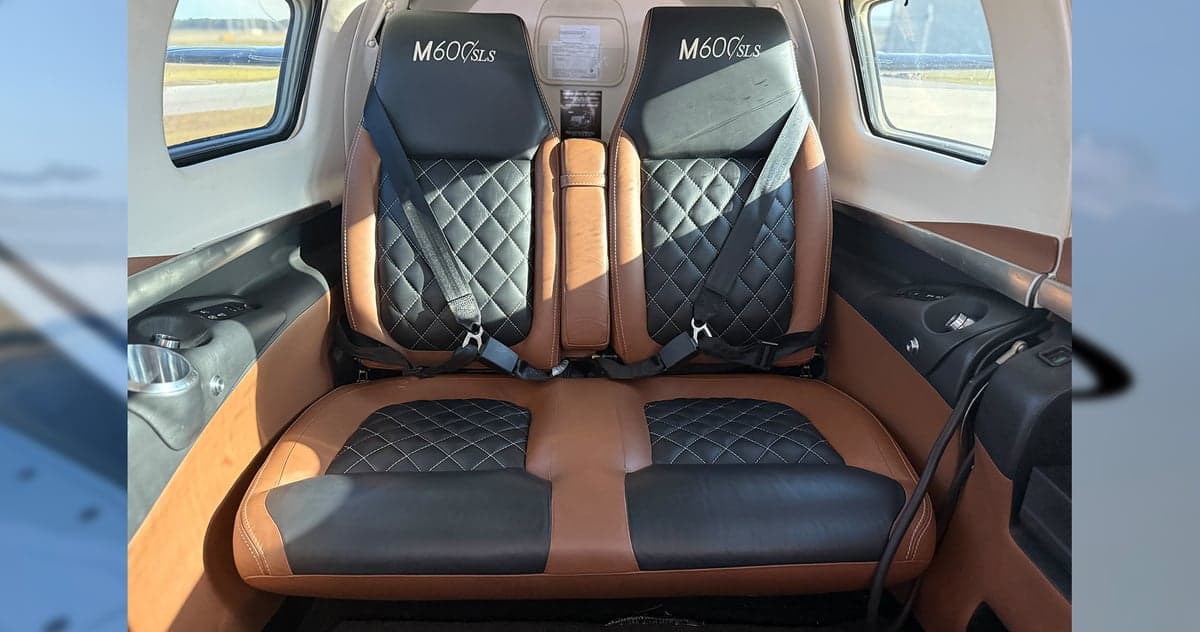 Rear seats of a Piper M600 SLS aircraft cabin.