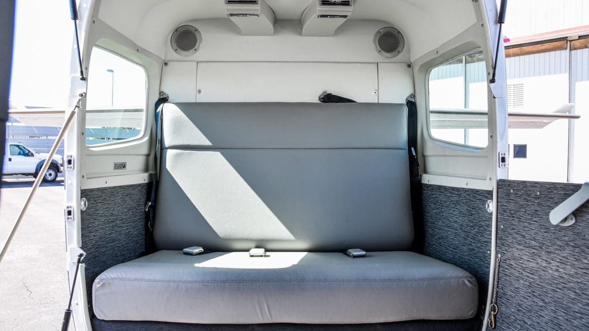 Rear bench seat in the cabin of a Cessna Caravan.
