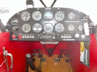 The cockpit instrument panel of the aircraft N27347.