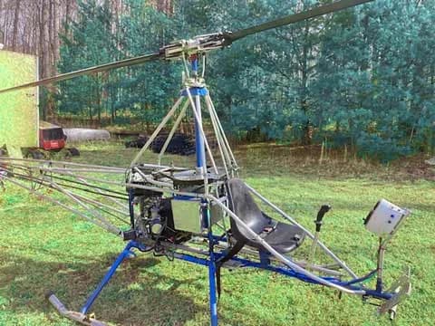 Close-up of the cockpit area of an A/W-95 helicopter.