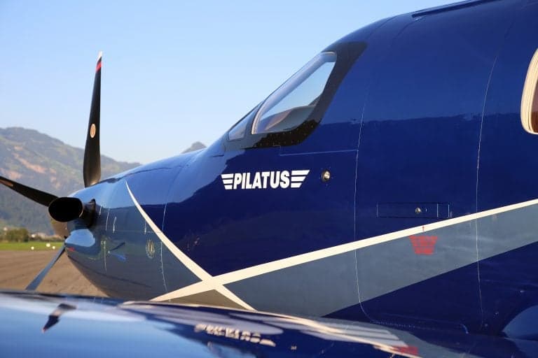 Close-up of the front of a Pilatus PC-12 NGX, showing the Pilatus logo.