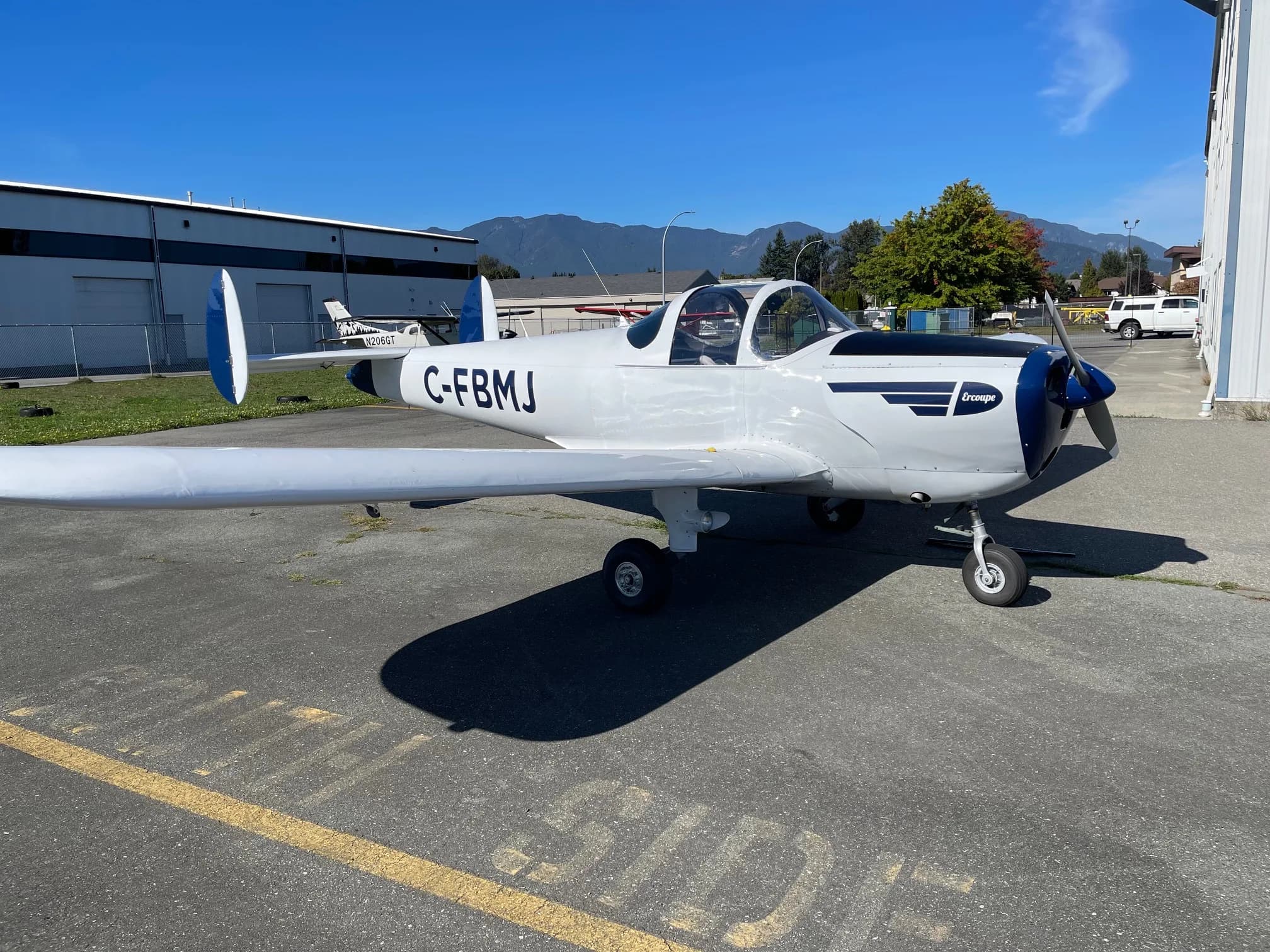 Side view of the Ercoupe CF-BMJ on the tarmac.