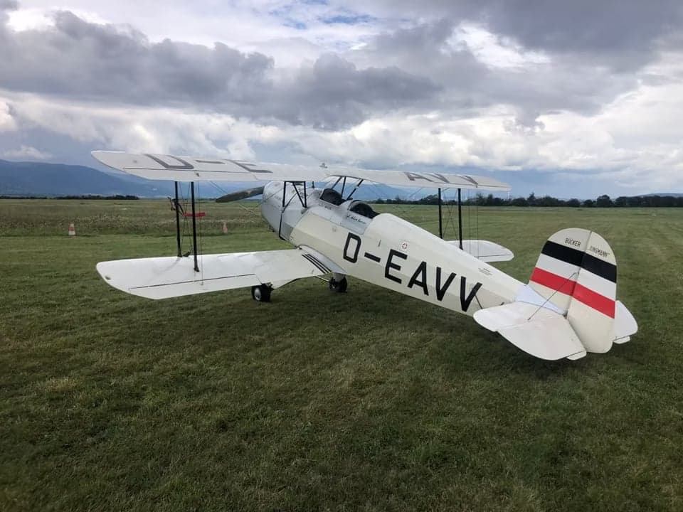D-EAVV biplane flying at sunset.