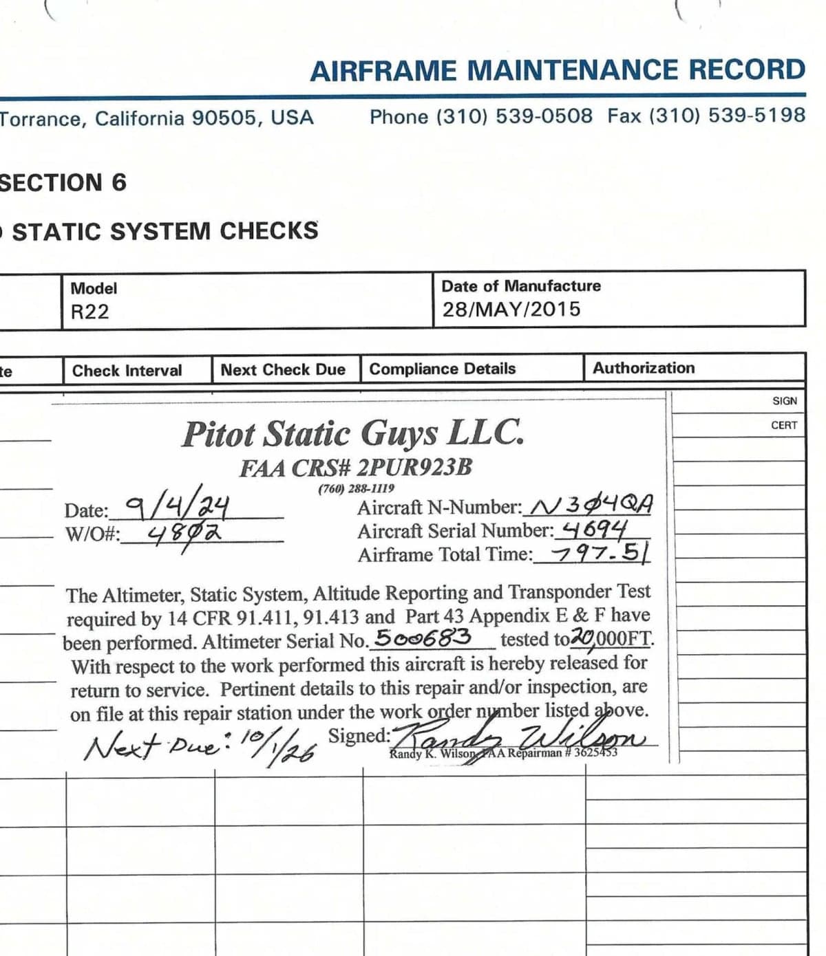 A close-up of an airframe maintenance record document for a Robinson R22 helicopter, showing static system checks and handwritten entries.