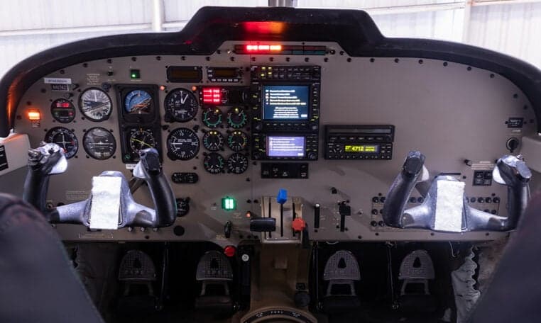 Detailed view of the instrument panel in the cockpit of the aircraft.