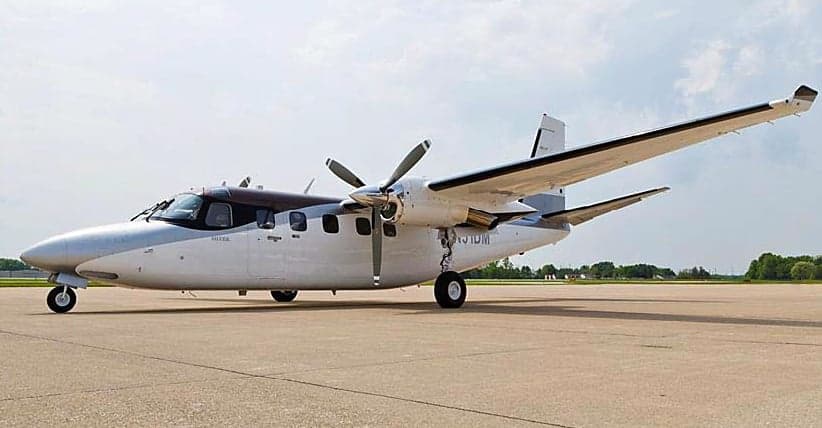 Side view of a Partenavia P.68 Observer 2 aircraft with registration N51DM on the tarmac.