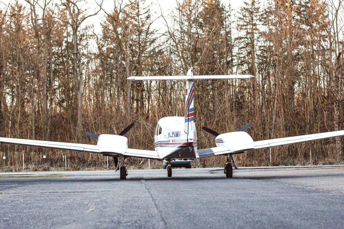 Rear view of the Piper Seminole D-GAMU on the ground.