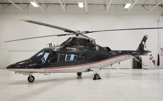 AgustaWestland AW109 Power helicopter in a hangar.