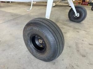 Close-up of the large tires on a Cessna 185 Skywagon.