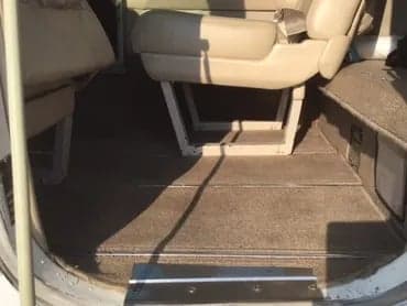 The entrance and floor of the cabin of a Cessna 421C Golden Eagle aircraft.