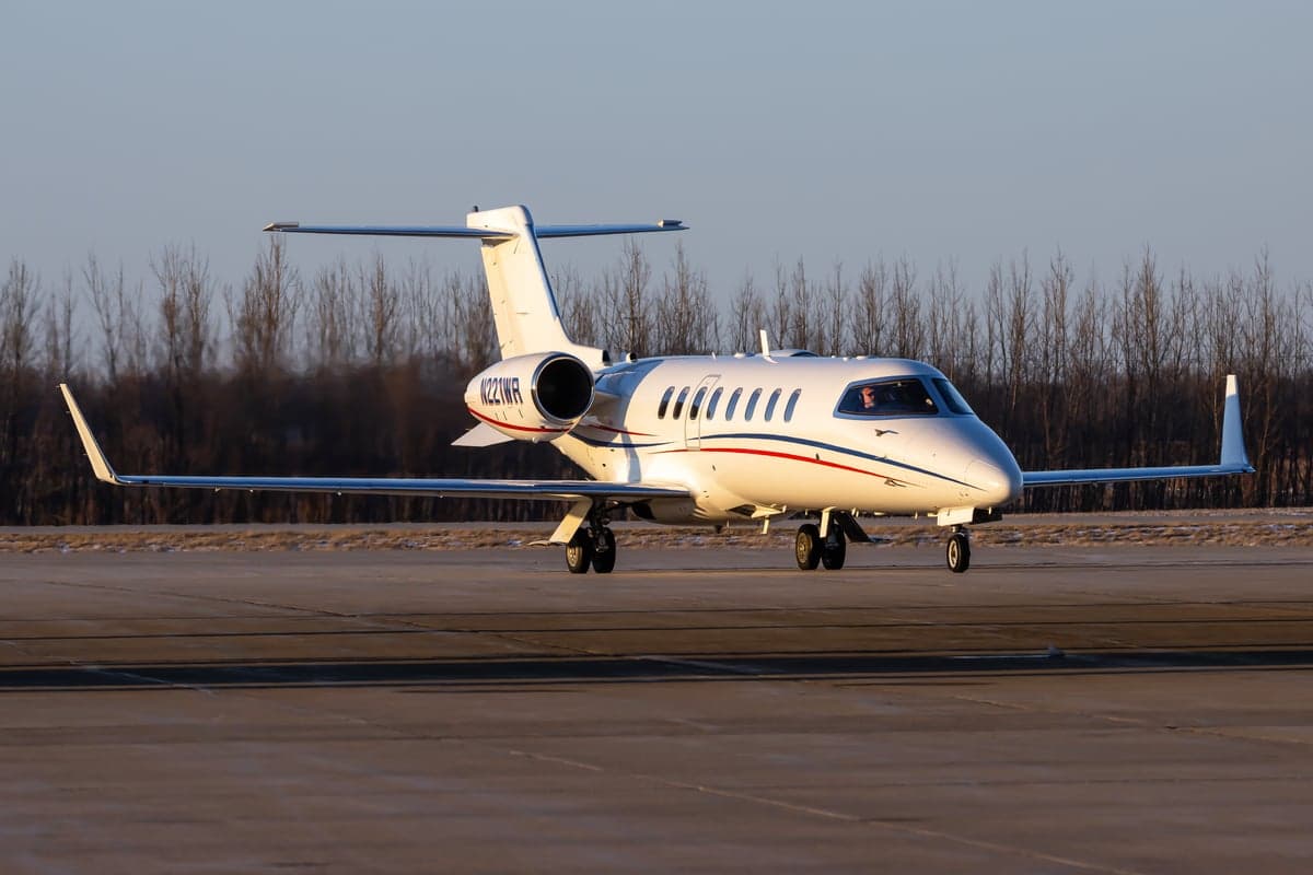A Learjet 45XR taxiing on the runway.