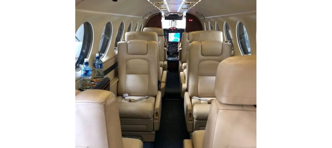 King Air cabin interior with tan leather seats.