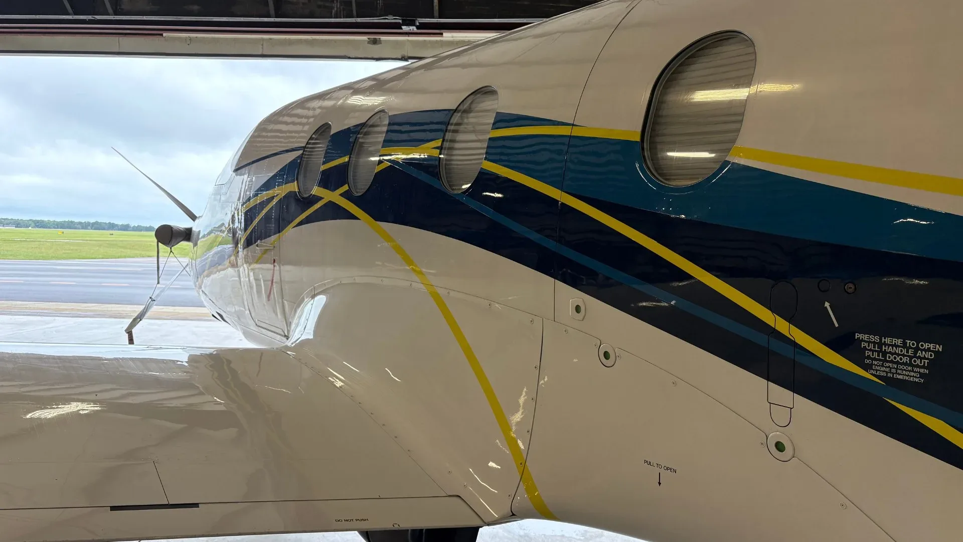 Close-up of the fuselage of Pilatus PC-12 aircraft N757BT.
