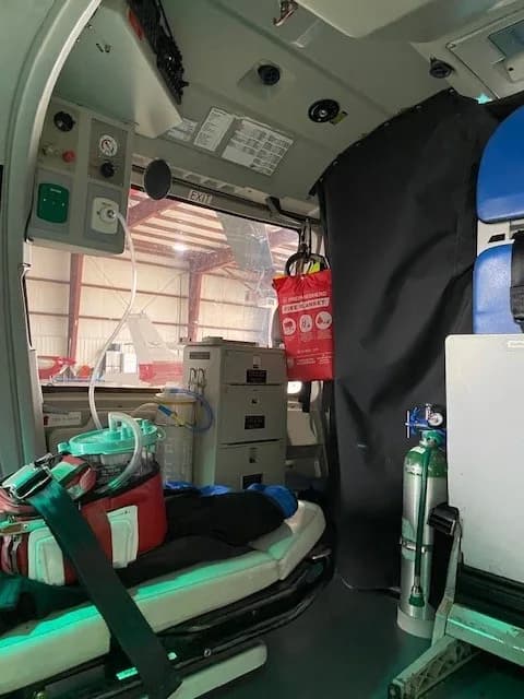 Interior view of the helicopter cabin with medical equipment.