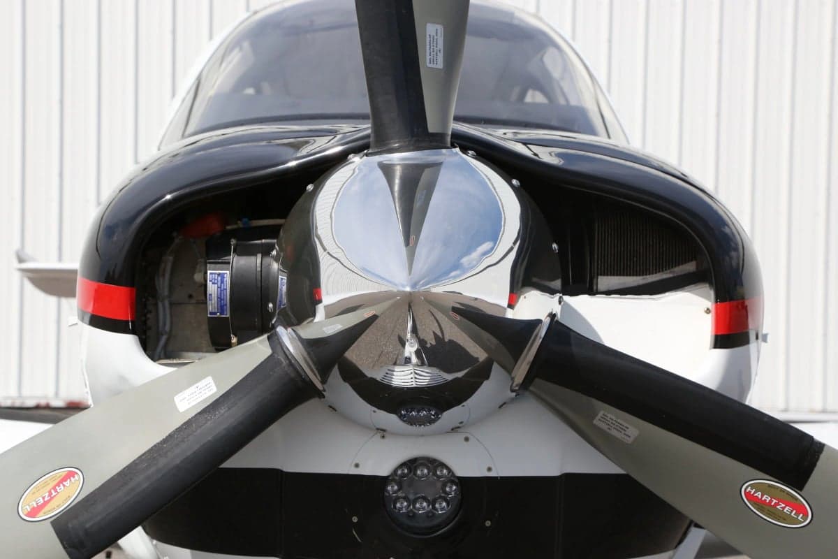 Extreme close up of the propeller and nose of a Beechcraft Bonanza G36.