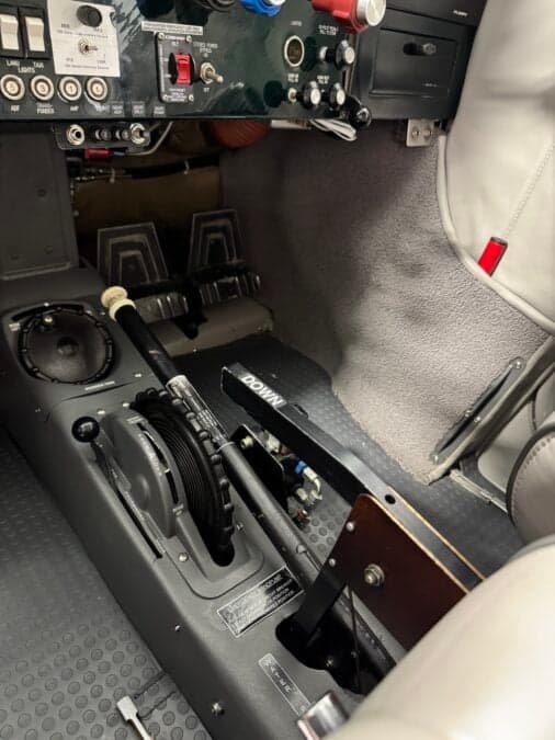View of the rudder pedals and throttle controls.