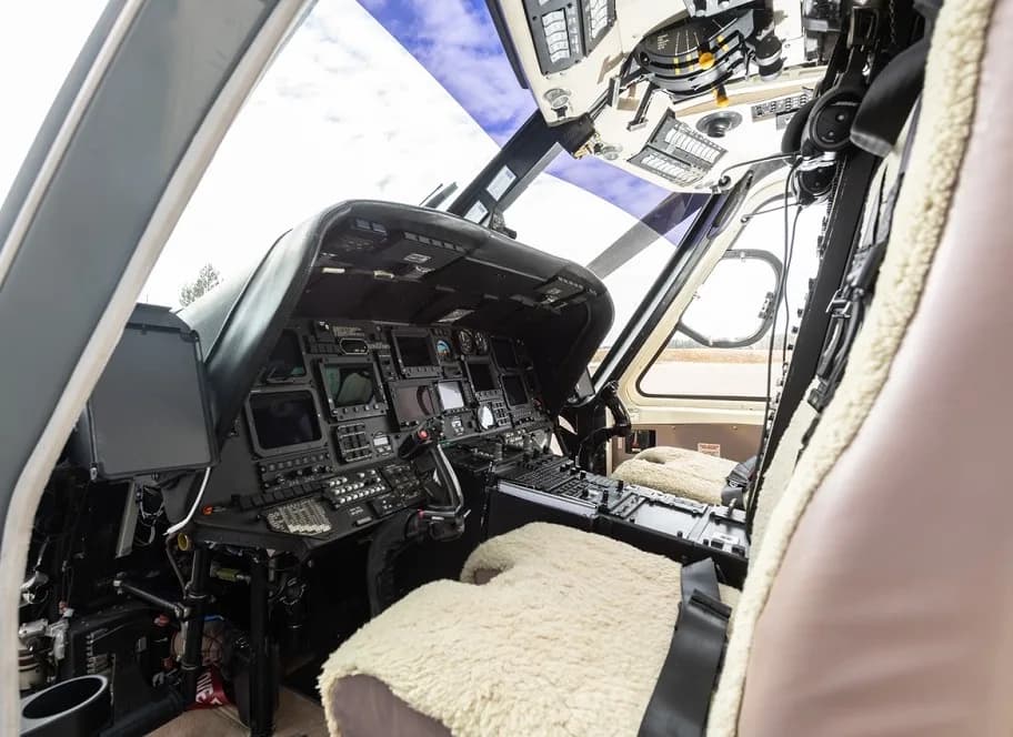 View of the helicopter's instrument panel and controls.