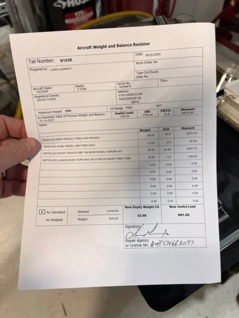 A close-up of an "Aircraft Weight and Balance Revision" document for tail number N193R.