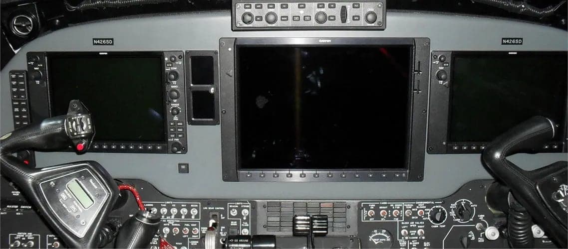 King Air cockpit instrument panel with Garmin avionics.