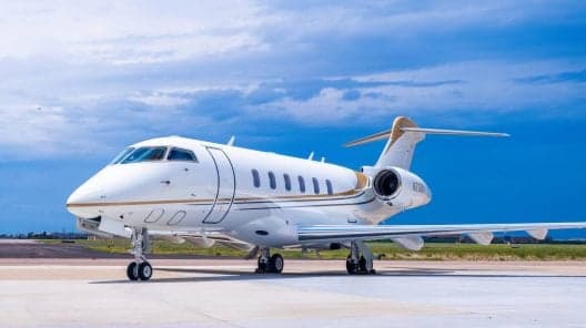 Bombardier Challenger 350 aircraft parked on the tarmac.