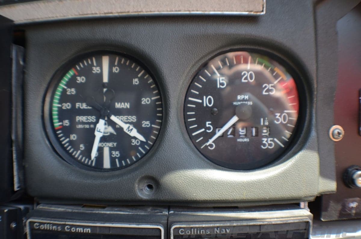 View of the Mooney Executive 21 aircraft's instrument panel and yokes.