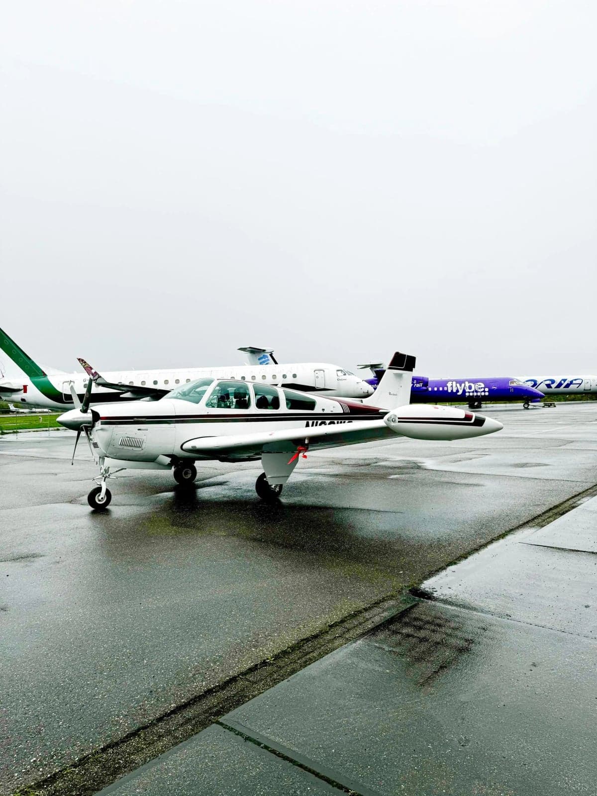 Close up of the tail section of N100WS Bonanza aircraft.
