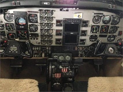 The cockpit of the King Air aircraft features a full array of instruments and controls.