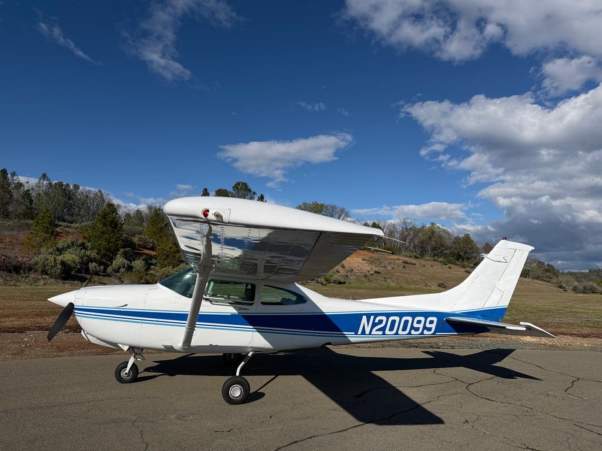 Aircraft N20099 parked on the tarmac.