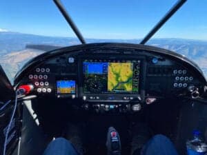 The instrument panel of a Cubcrafters aircraft in flight.