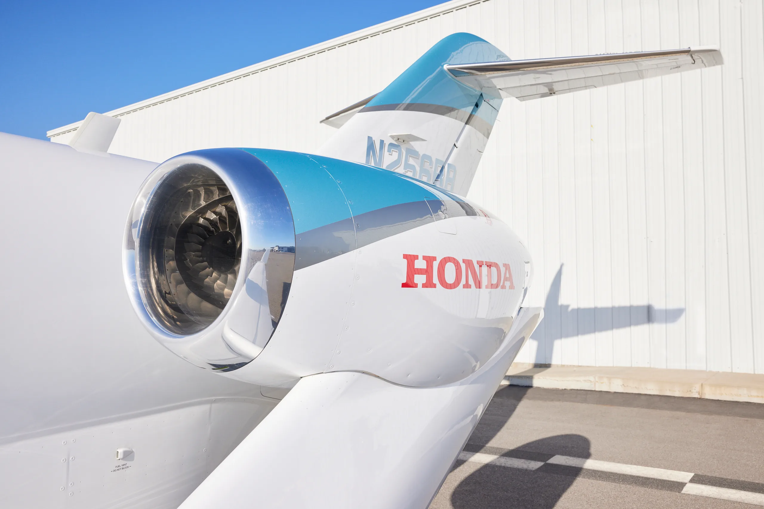 Close-up of the HondaJet Elite engine with registration N256BB.