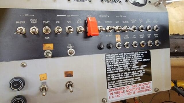 Close-up of the instrument panel and controls inside the cockpit of an aircraft.