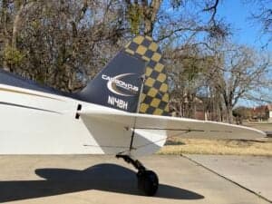 Tail section of a Carbon Cub aircraft with tail number N14BH.