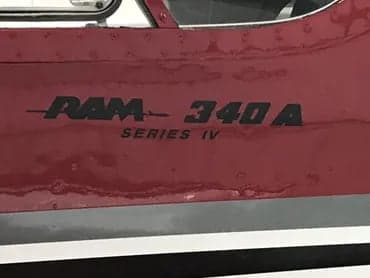 Close-up of the RAM 340A Series IV logo on the side of the aircraft.