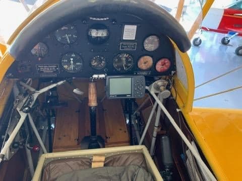 View of the instrument panel and cockpit of the biplane.